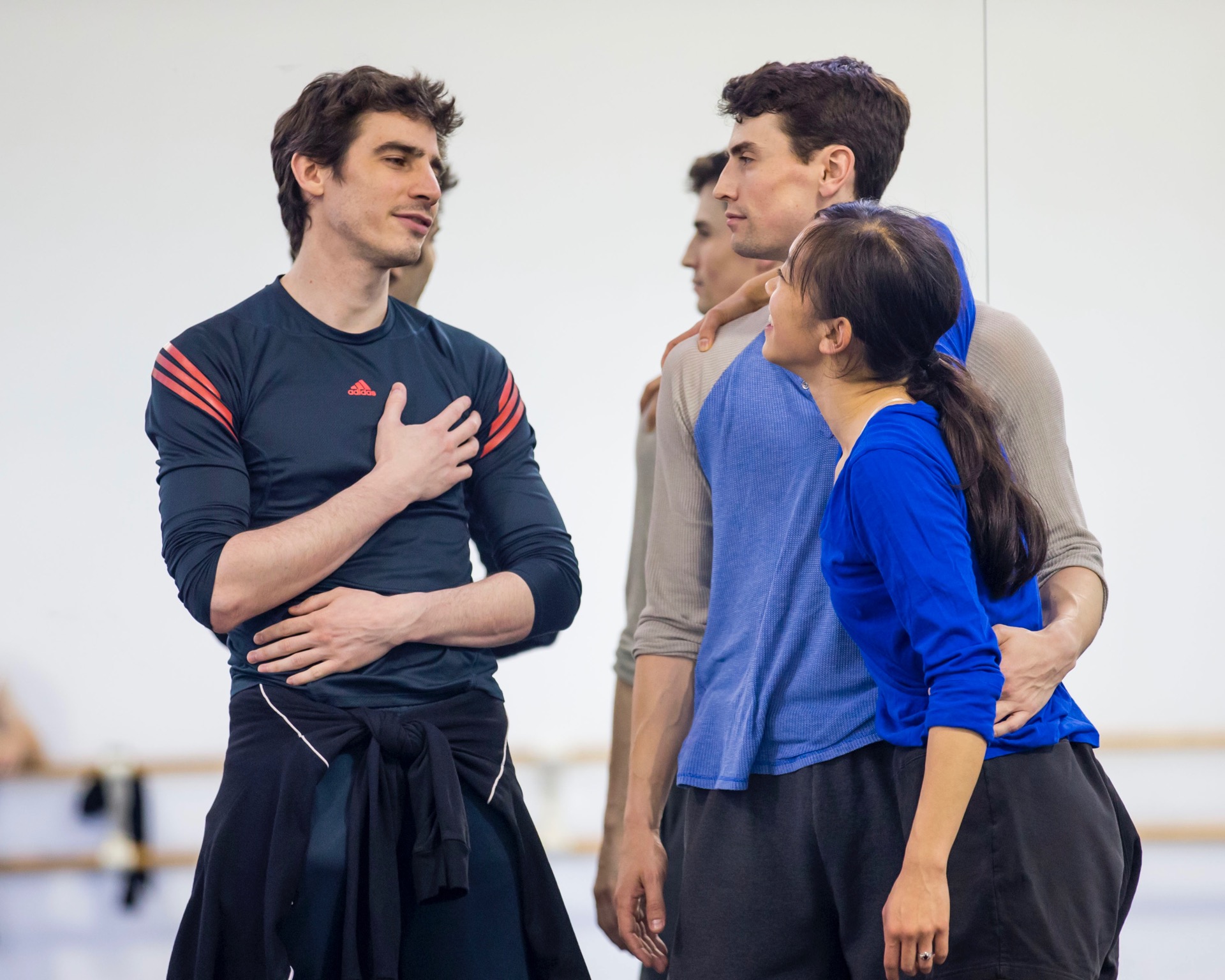 Resident Choreographer Alejandro Cerrudo with Hubbard Street Dancers Andrew Murdock, center, and Jessica Tong. Photo by Todd Rosenberg.