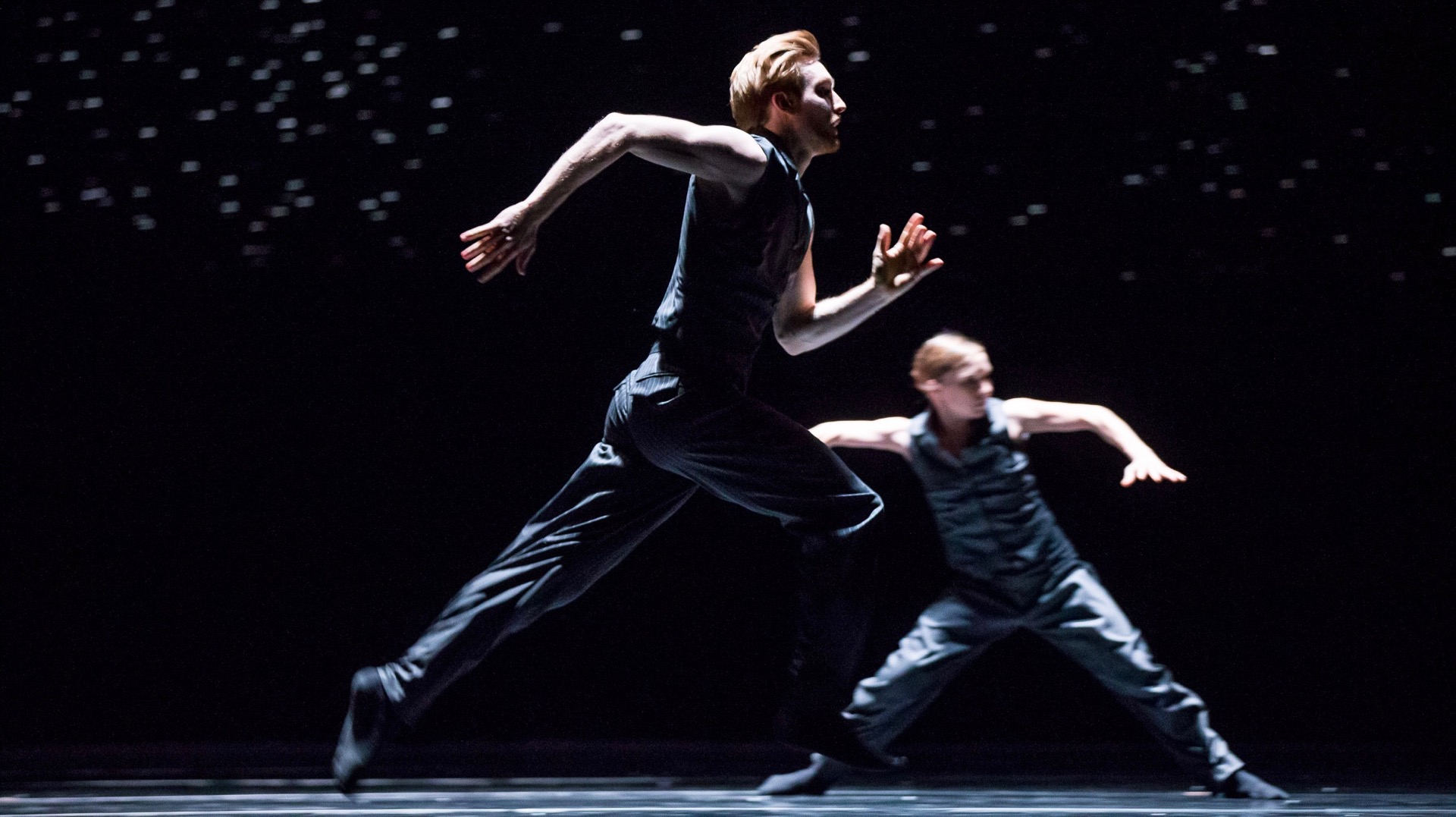 Hubbard Street Dancers Florian Lochner, foreground, and Kellie Epperheimer in Solo Echo by Crystal Pite. Photo by Todd Rosenberg.