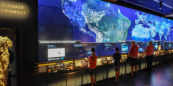 Climate change section featuring a media wall comprised of 36 high-definition 55-inch screens with 