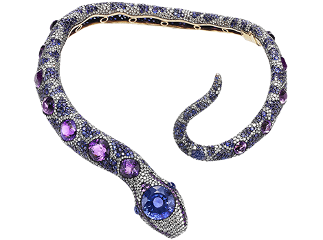 Serpent necklace with larger jewels dotted along its back.