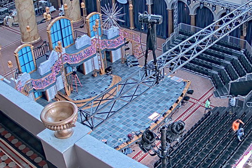 stage under construction in the National Building Museum atrium, seen from above