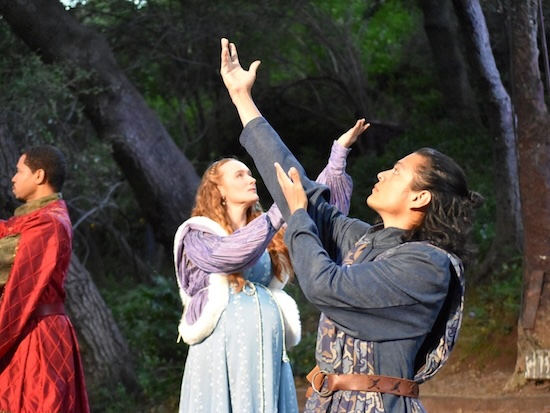 Characters from The Winter's Tale at Will Geer's Theatricum Botanicum gesture upward, with Hermione visibly pregnant and wearing a winter jacket