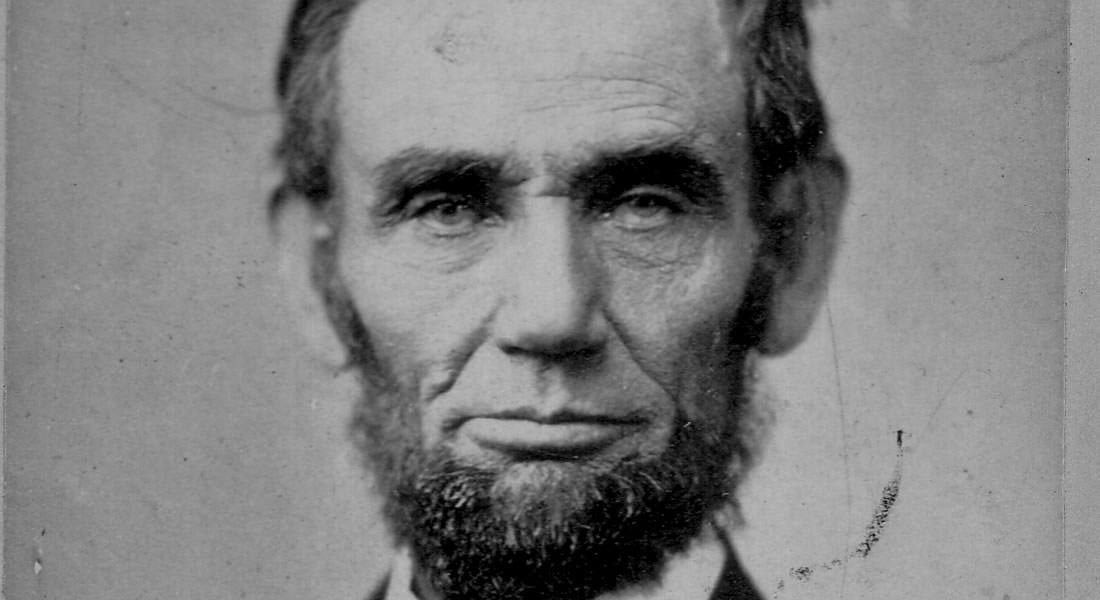 Black and white photo of Abraham Lincoln's face. 