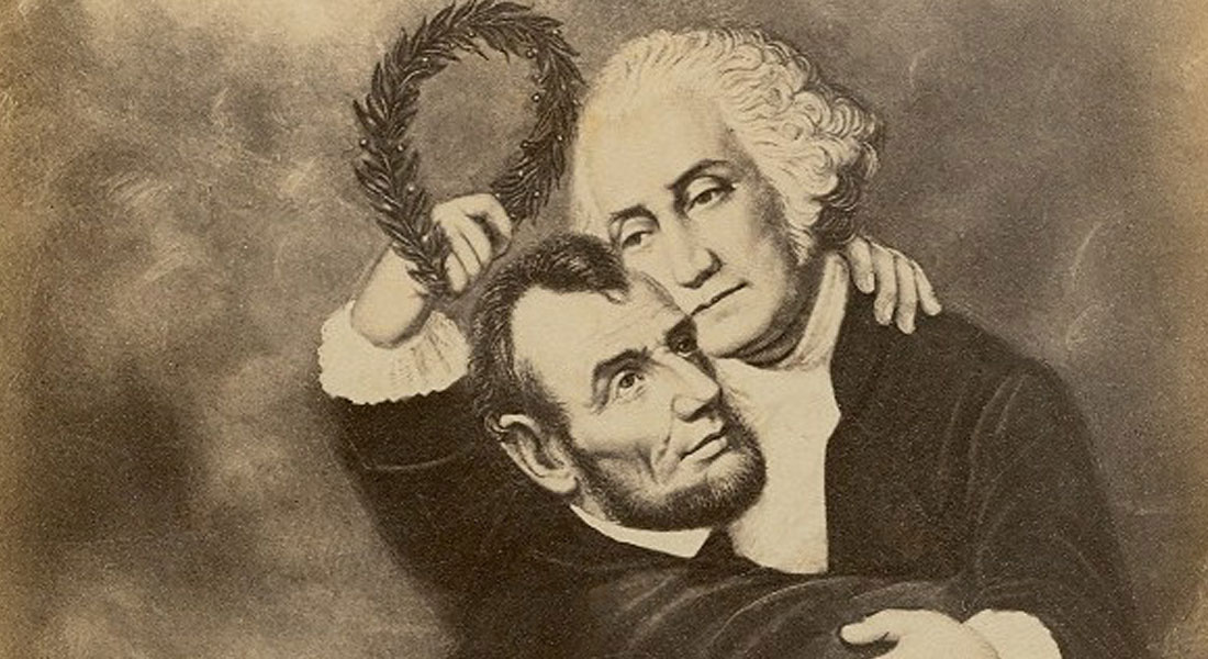 Black-and-white card featuring two men embracing, surrounded by clouds and angels. One man is George Washington, with a white wig. The other is Abraham Lincoln, with a beard. Washington is embracing Lincoln.