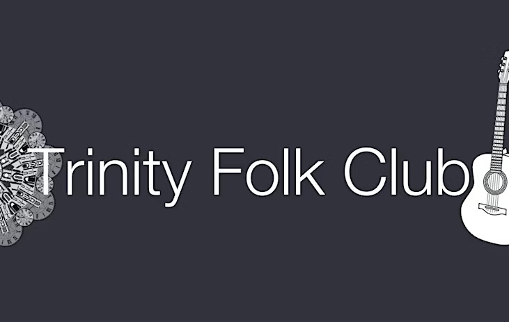 The wording 'Trinity Folk Club' is visible on a dark grey background. There is a small acoustic guitar to the right of the image and a flower to the left. These are coloured white.
