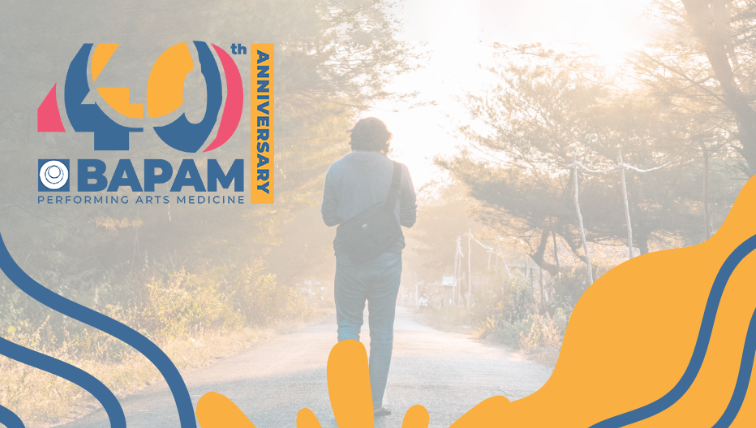 BAPAM logo against a person taking a mental health walk in the countryside