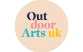 Out door arts UK is written in purple, pink, blue, and yellow against a peach background