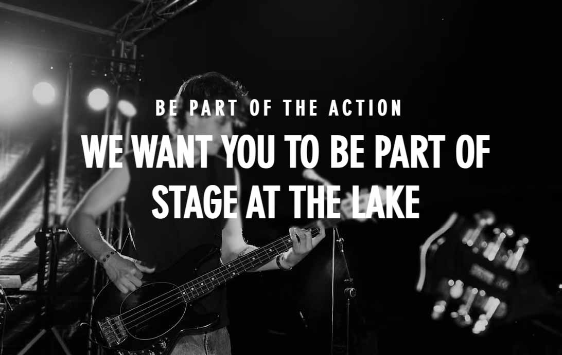 A young man is playing guitar and wearing a black vest. There is white writing across the image asking people to get involved
