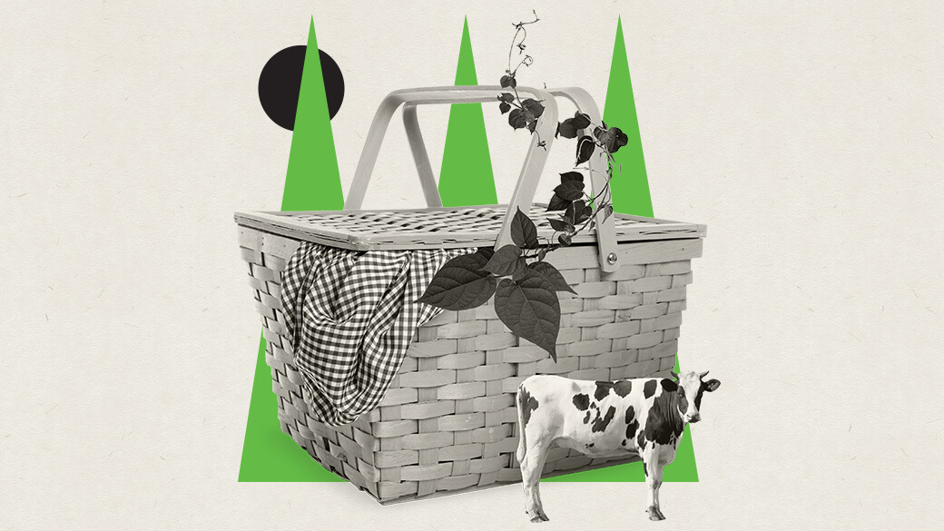 A monochrome collage on a flecked, off-white background features three lime-green triangle shapes resembling trees sitting behind an oversized picnic basket with a checkered hand towel and a sprouting beanstalk. A solid black circle representing the moon sits behind the trees and a spotted dairy cow stands in front of the picnic basket. 