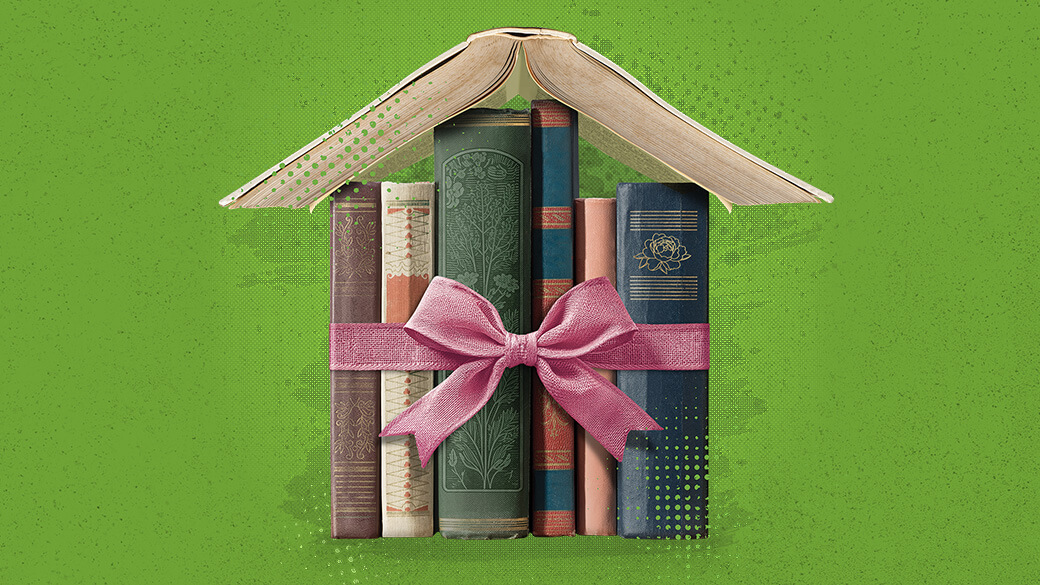 A set of six books tied together with a pink ribbon with one book on top forming a roof making the whole structure look like a house on a green background