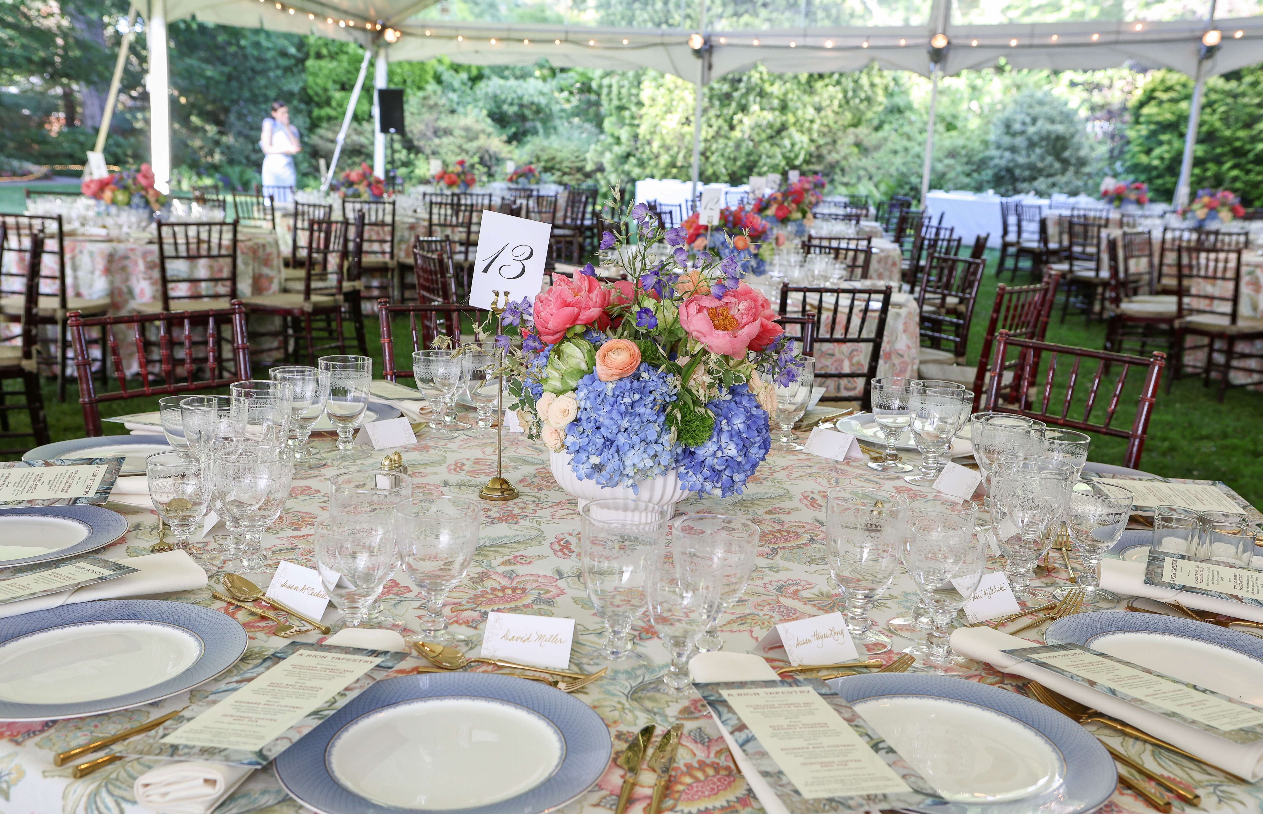 Dining tables under the tent on the Lunar Lawn.