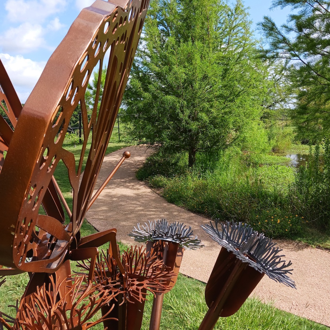 New monarch butterfly sculpture rests near McNair Foundation Cypress Forest