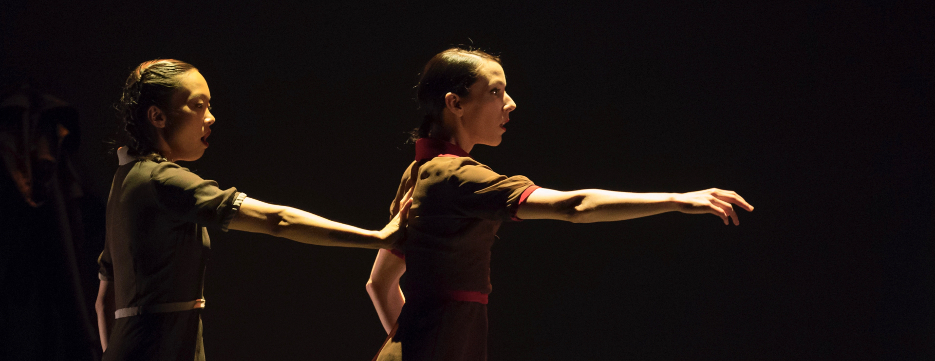 Hubbard Street Dancers Jessica Tong, left, and Ana Lopez in The Impossible by Resident Choreographer Alejandro Cerrudo. Photo by Todd Rosenberg.