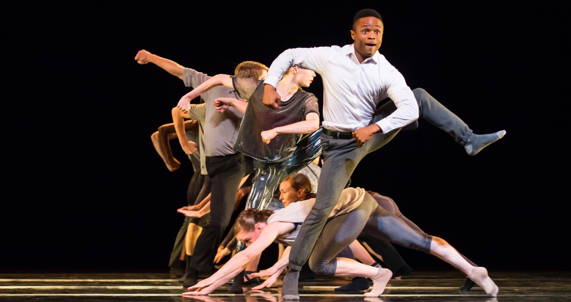 John-Michael Lyles, foreground, in Hubbard Street + The Second City’s The Art of Falling. Photo by Todd Rosenberg.