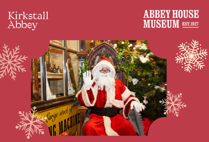 Santa at the museum waving