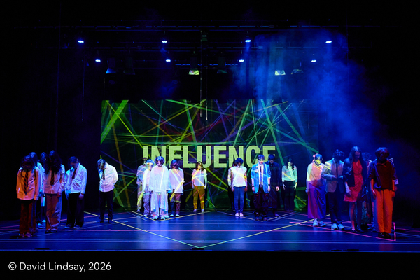 A group of young people on a stage, the word Influence is projected behind them. © David Lindsay, 2006