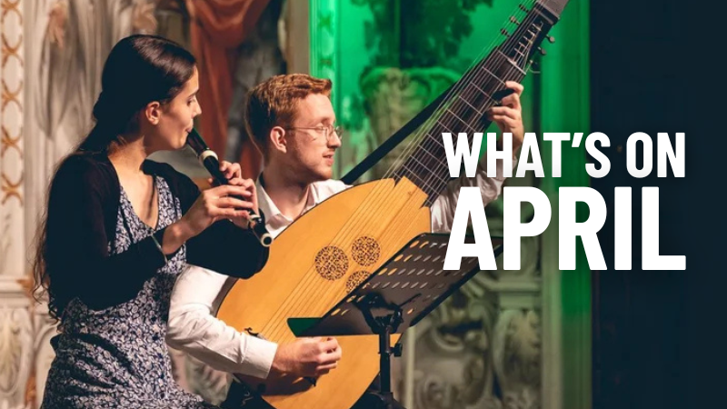 A young woman playing a flute and a young man playing a traditional stringed guitar instrument.