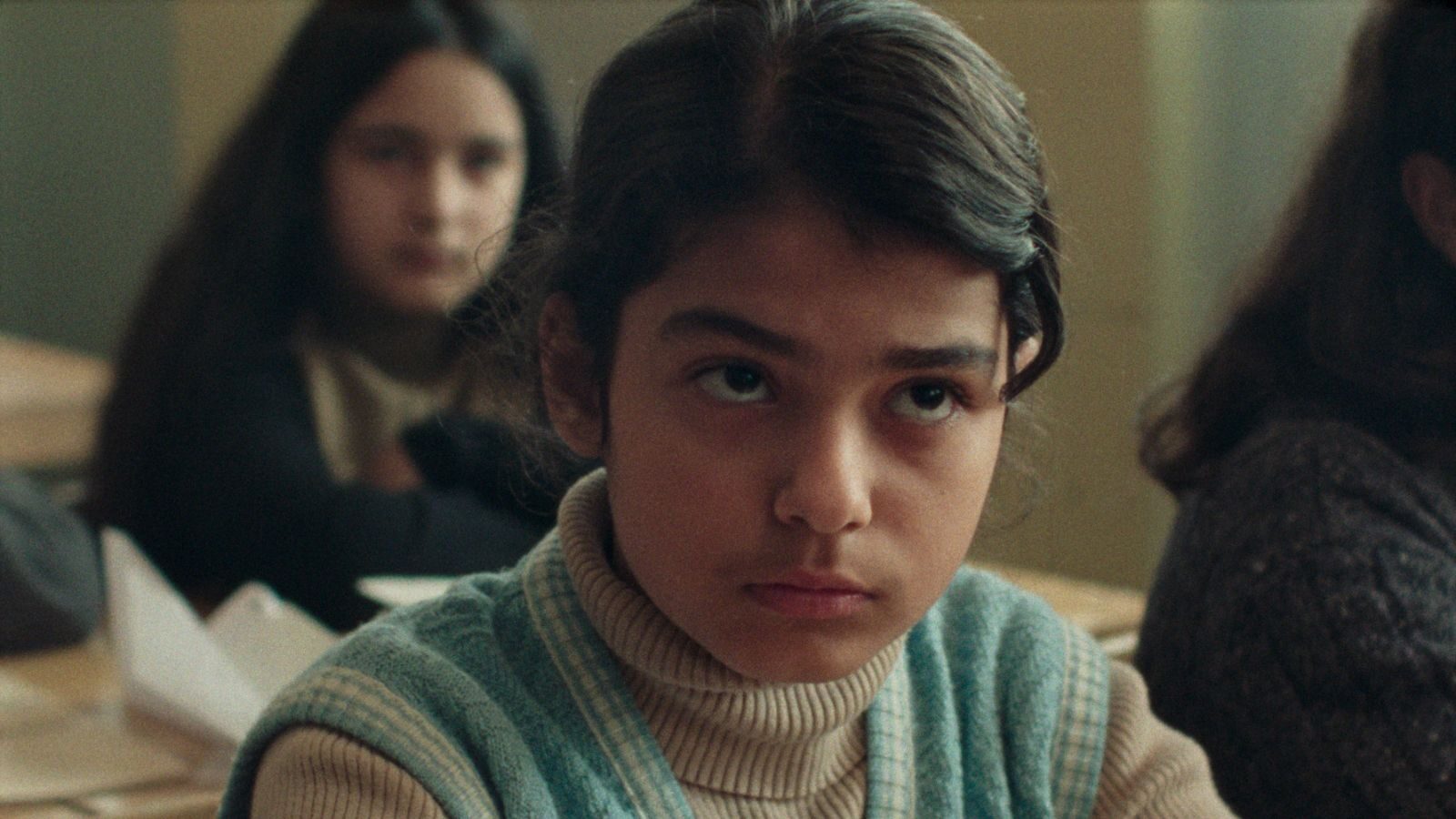 Still from Universal Language showing a young girl with a questioning expression.