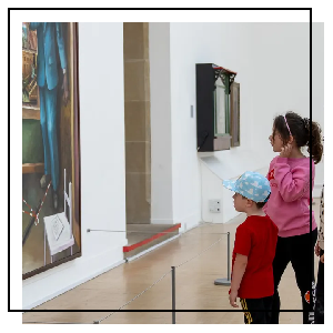 A man and child watch some deer