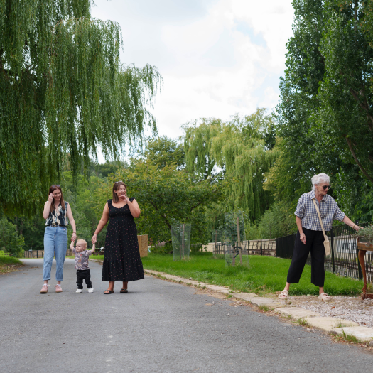 family walking through the grounds of leeds industrial museum