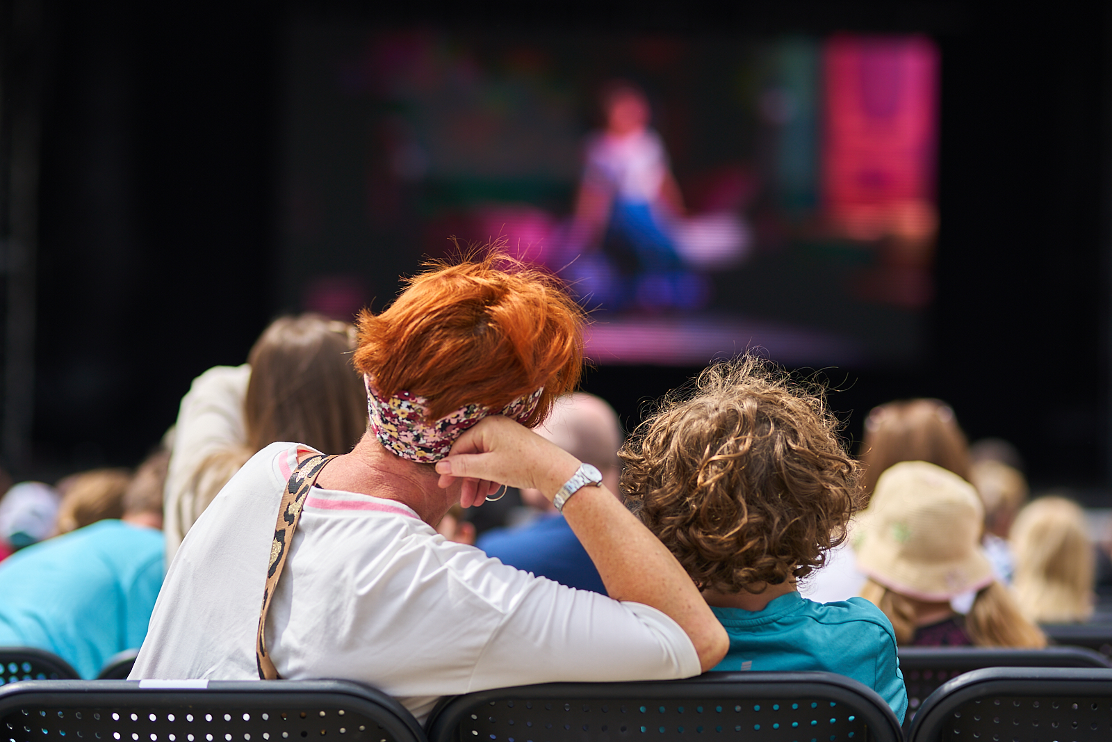 A family watch Cinema on the Square
