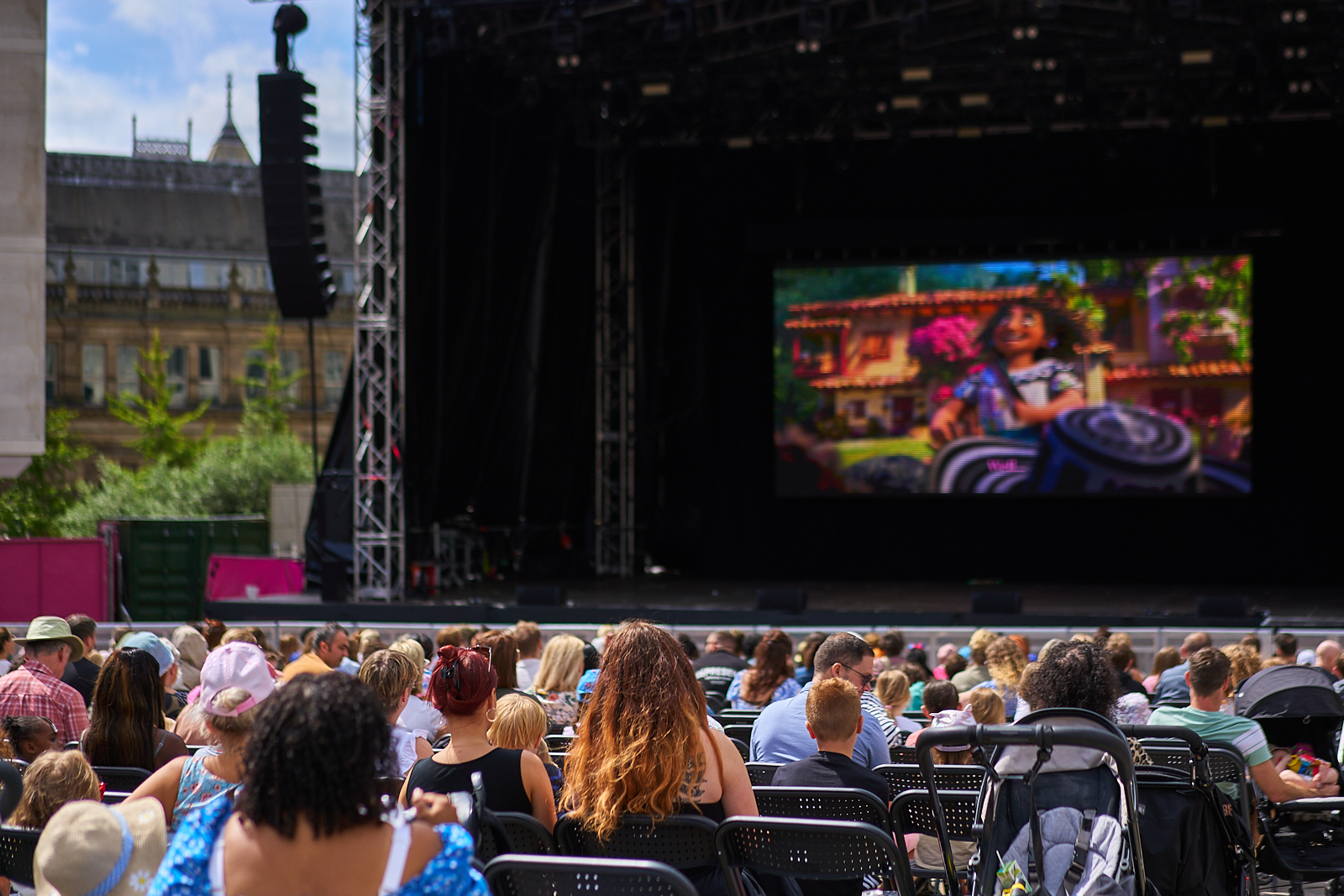 A crowd of people watch Cinema on the Square