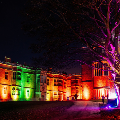 Temple Newsam house lit up with coloured lights