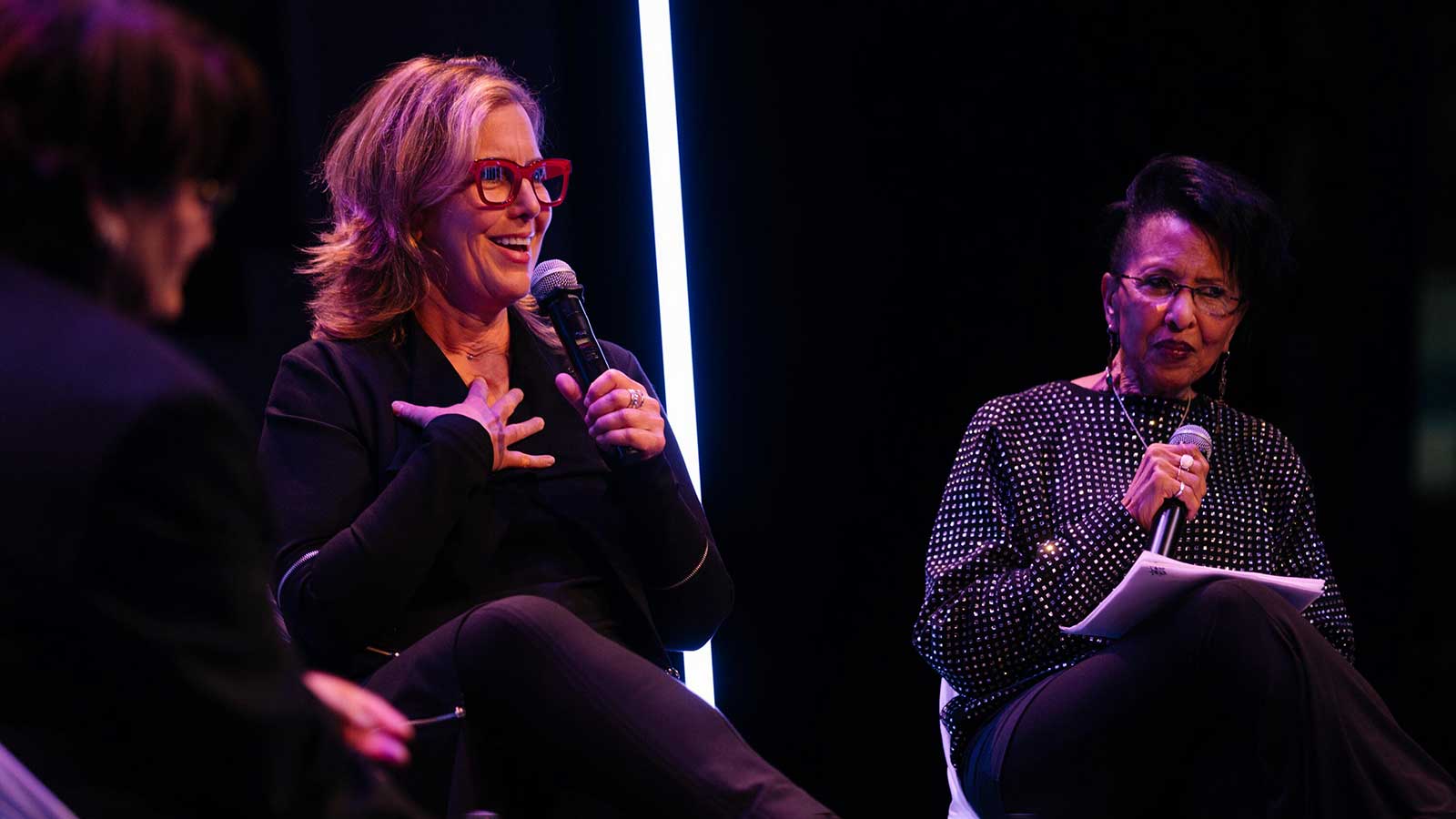 three speakers on a panel