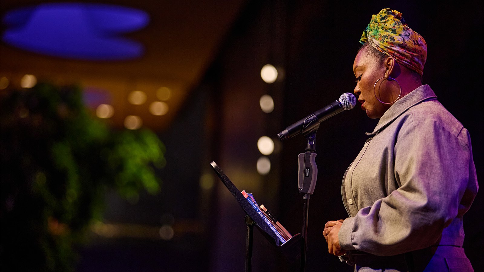 Mahongany L Brown at a microphone