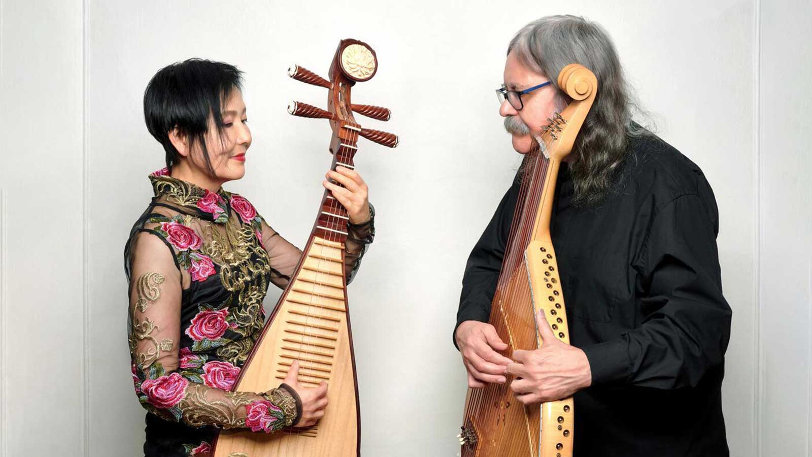 two musicians look at each other