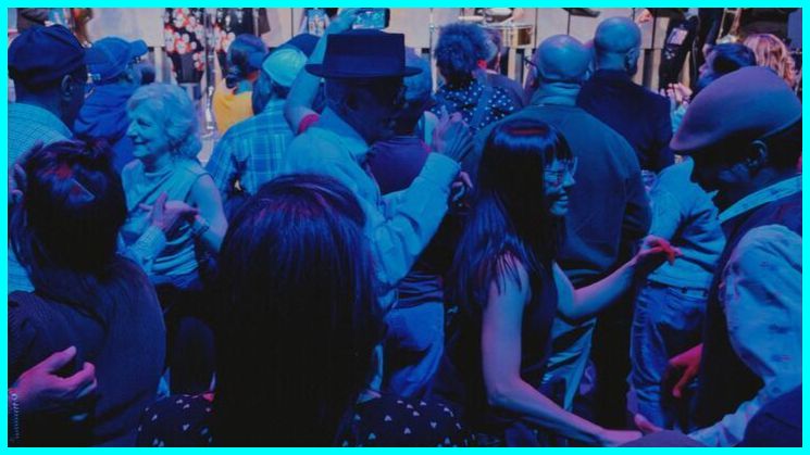 Audience watching a performance at the Atrium