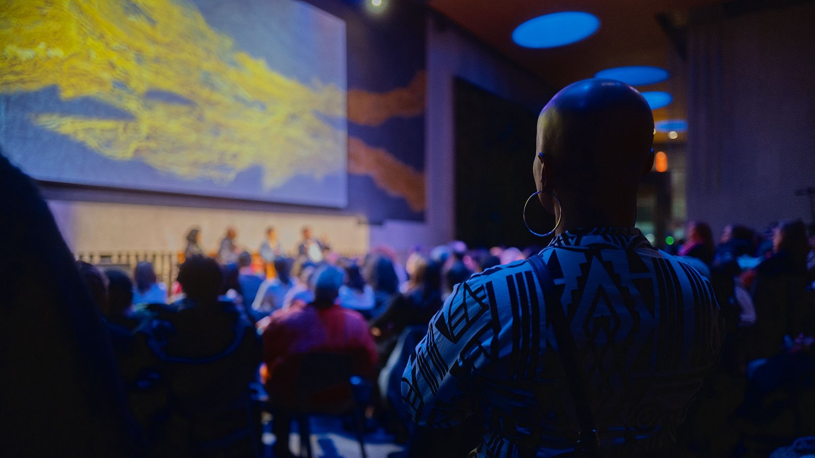 An audience watching a screening