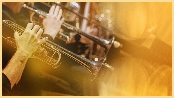 Musicians play brass instruments