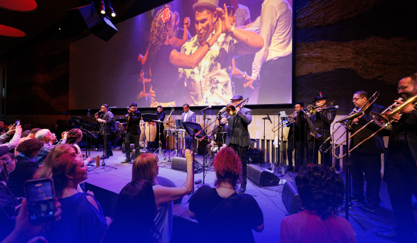 A band plays on the Atrium stage