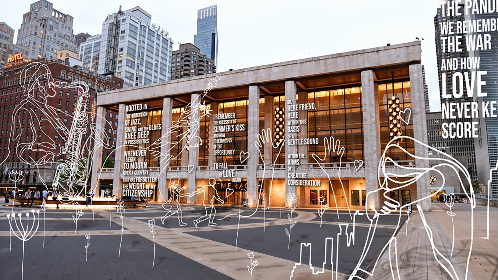 A man speaks into a microphone with an image on screen behind him