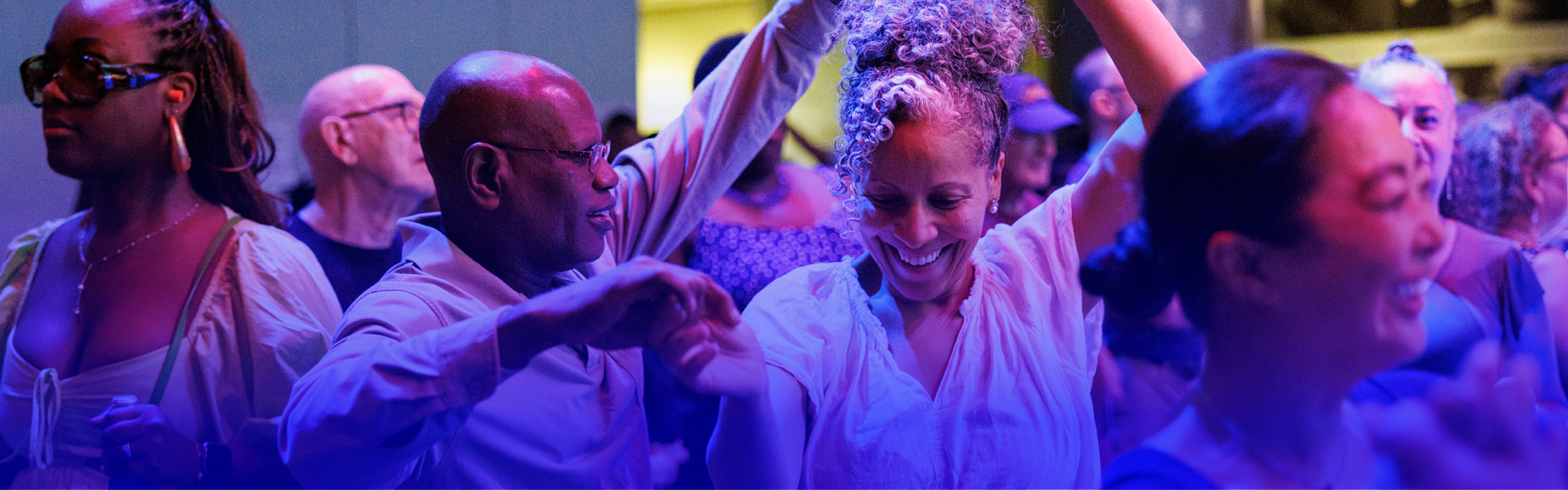 People dance and smile
