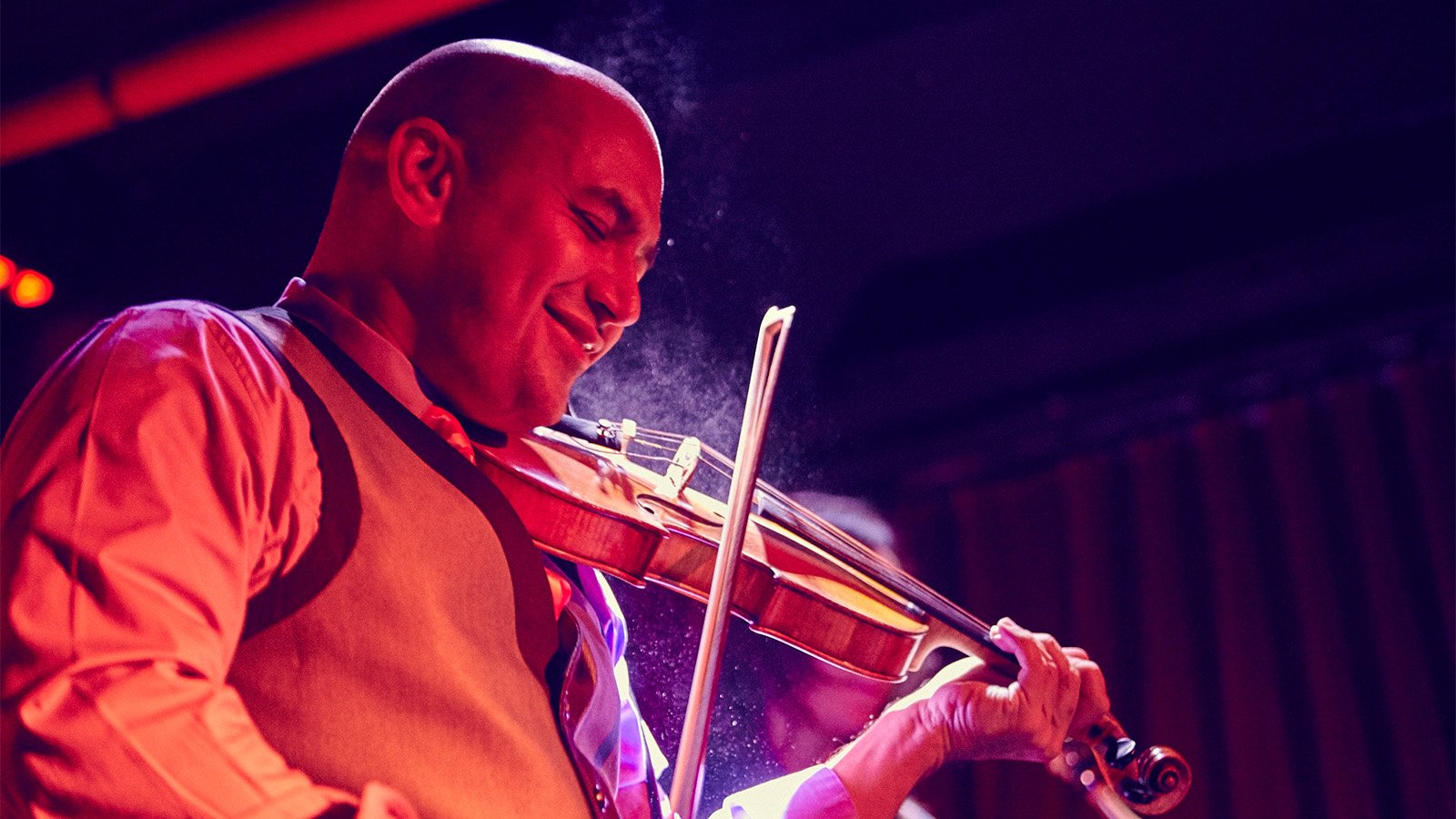 A black and grey tiled background with two cartoon avatars, bubble tea, and a rainbow flag