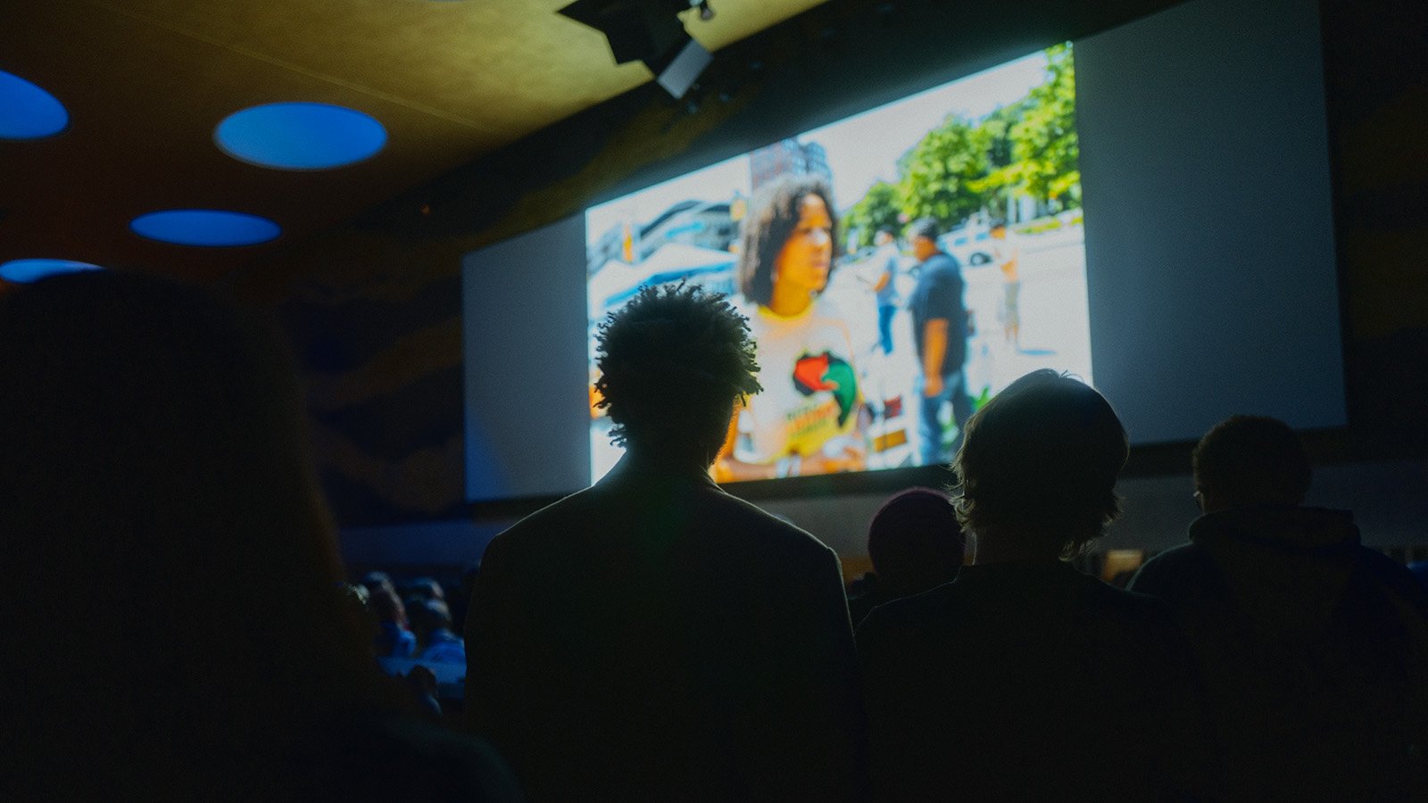 Audience watching a movie at the Atrium