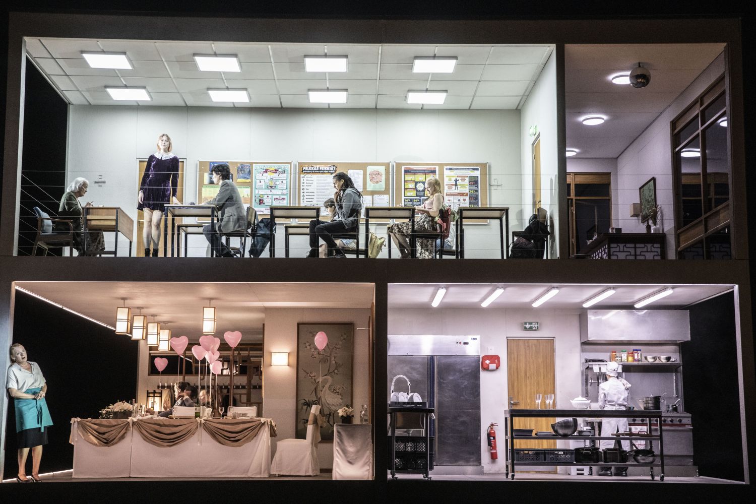 A woman with blonde hair wearing a white dress lying on a marble slab
