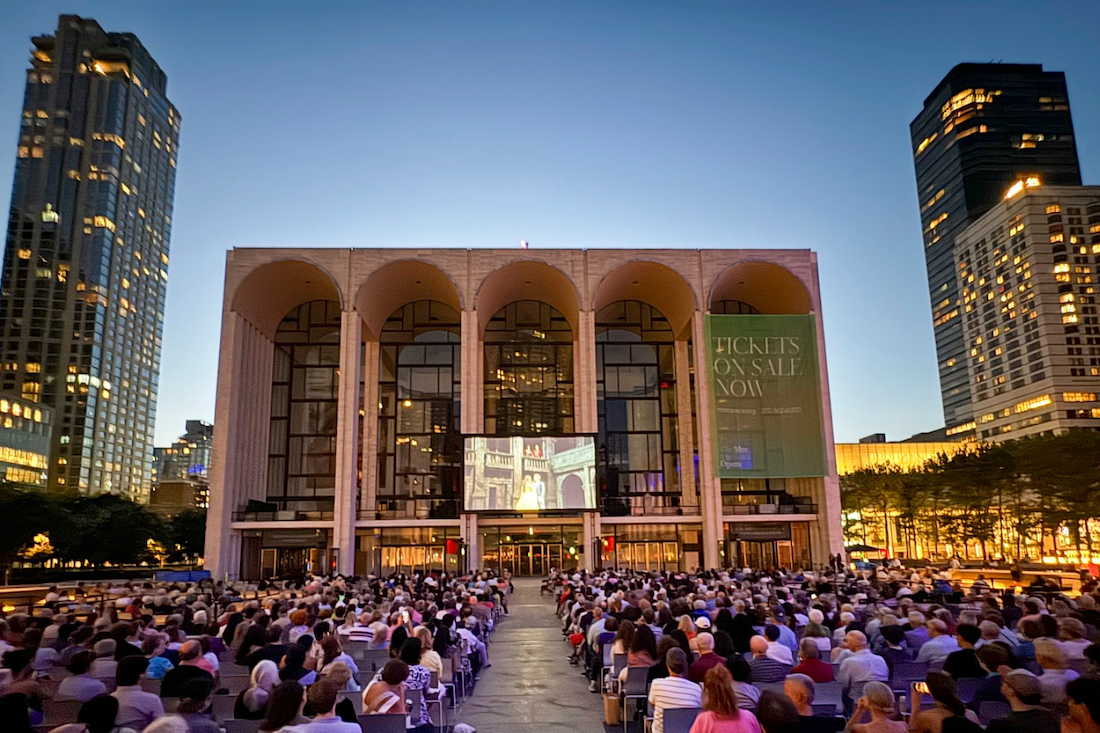 Audience watching a performance at an outdoor stage