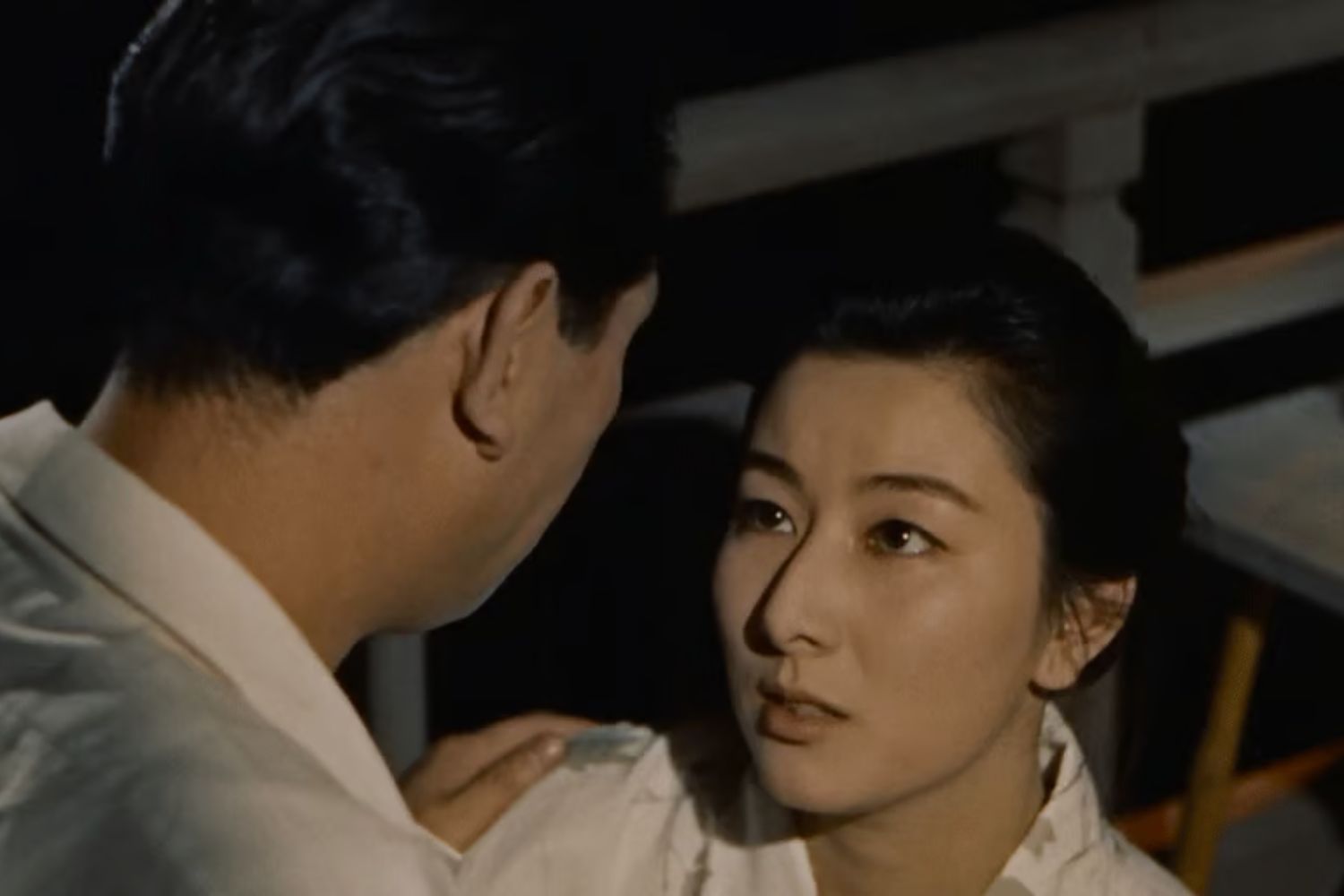 Ballet dancers in white outfits on stage