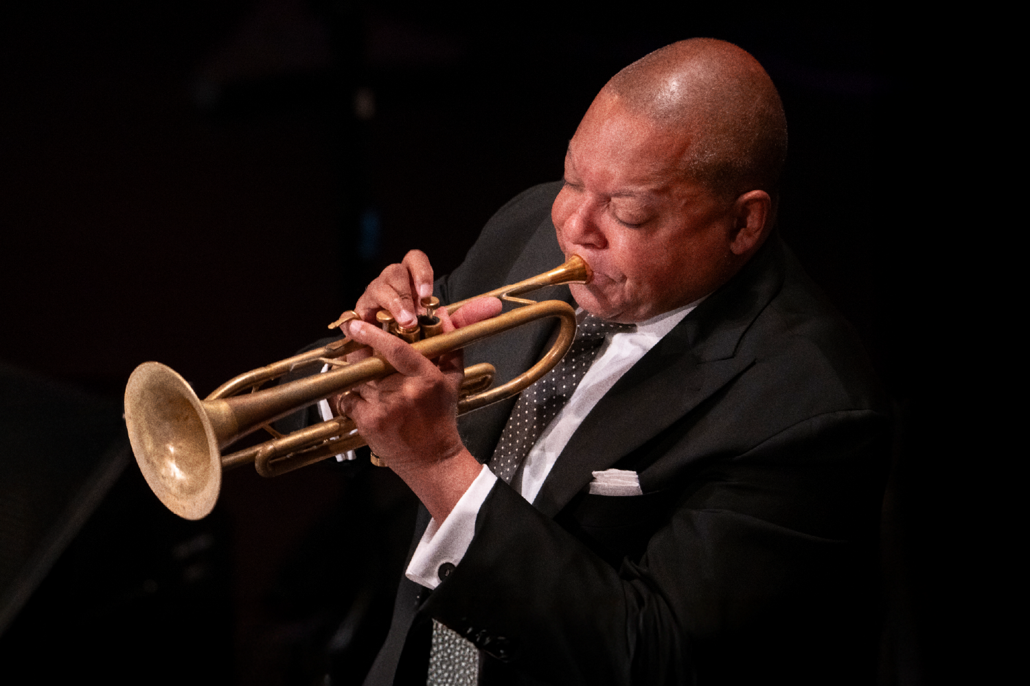 A man playing the trumpet