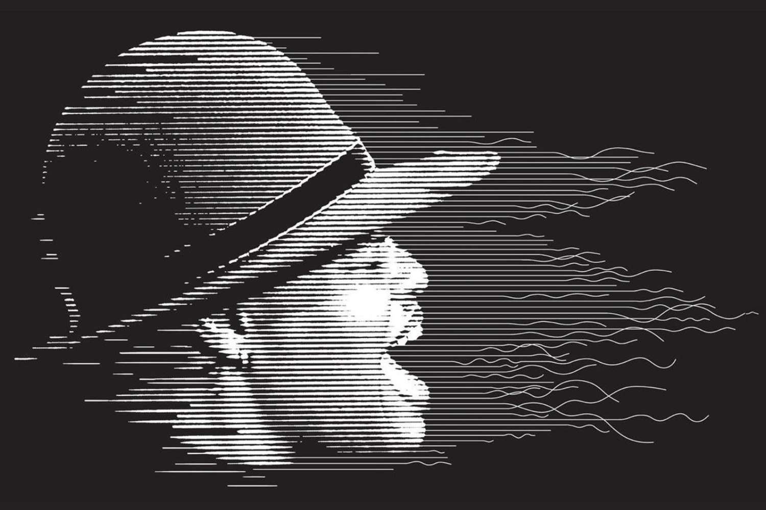 A man in a yellow t-shirt laying on his side in front of a projected version of Hamlet