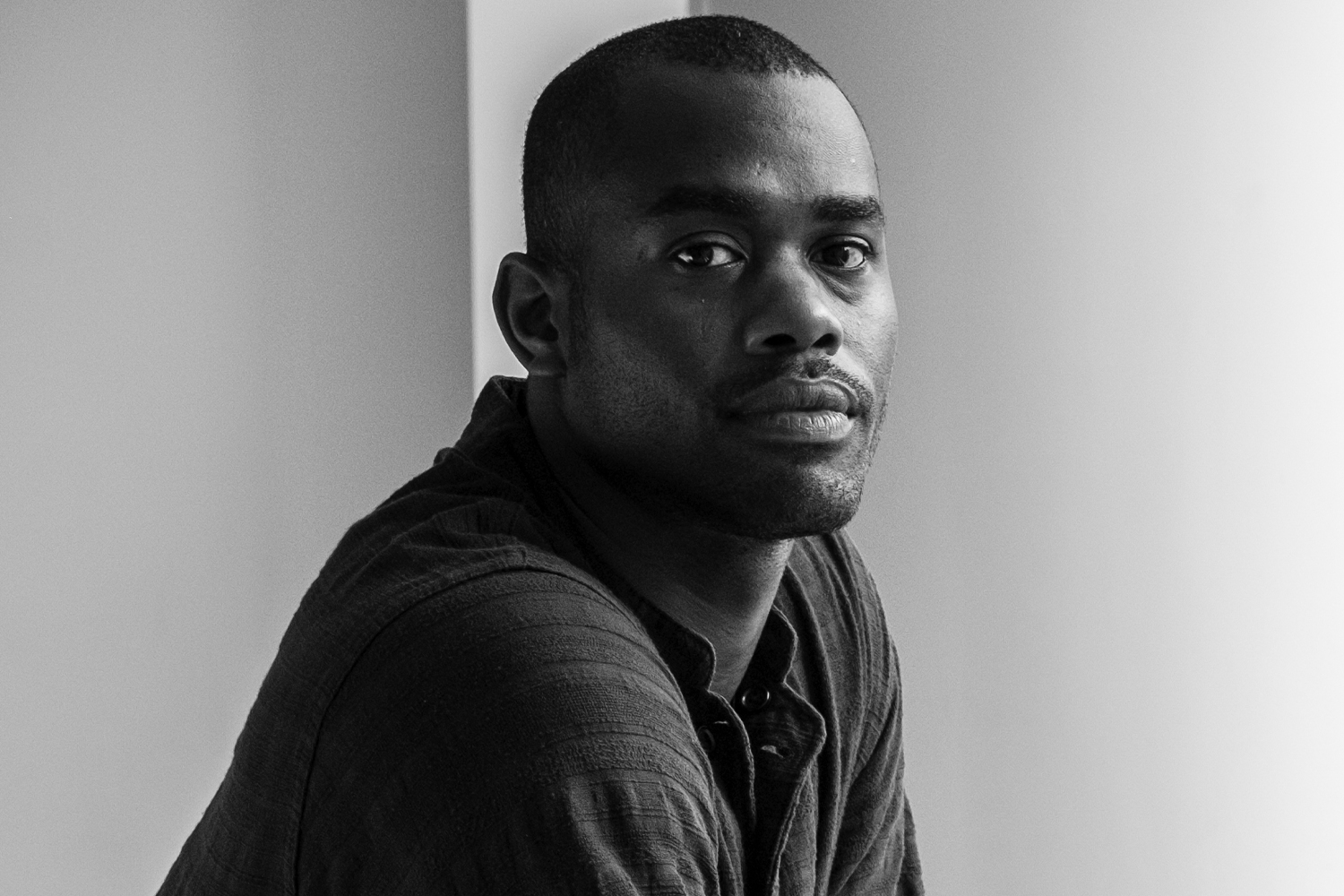 Ballet dancers in white outfits on stage