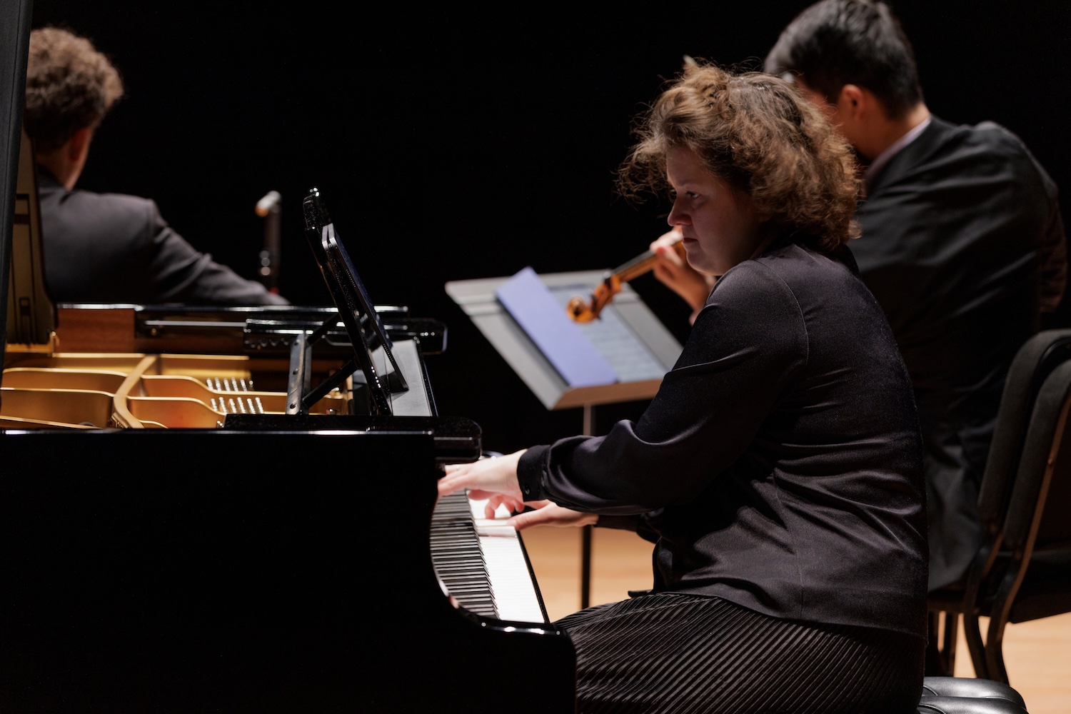 A woman playing the piano
