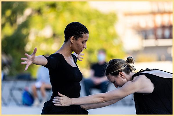 Two dancers outdoors