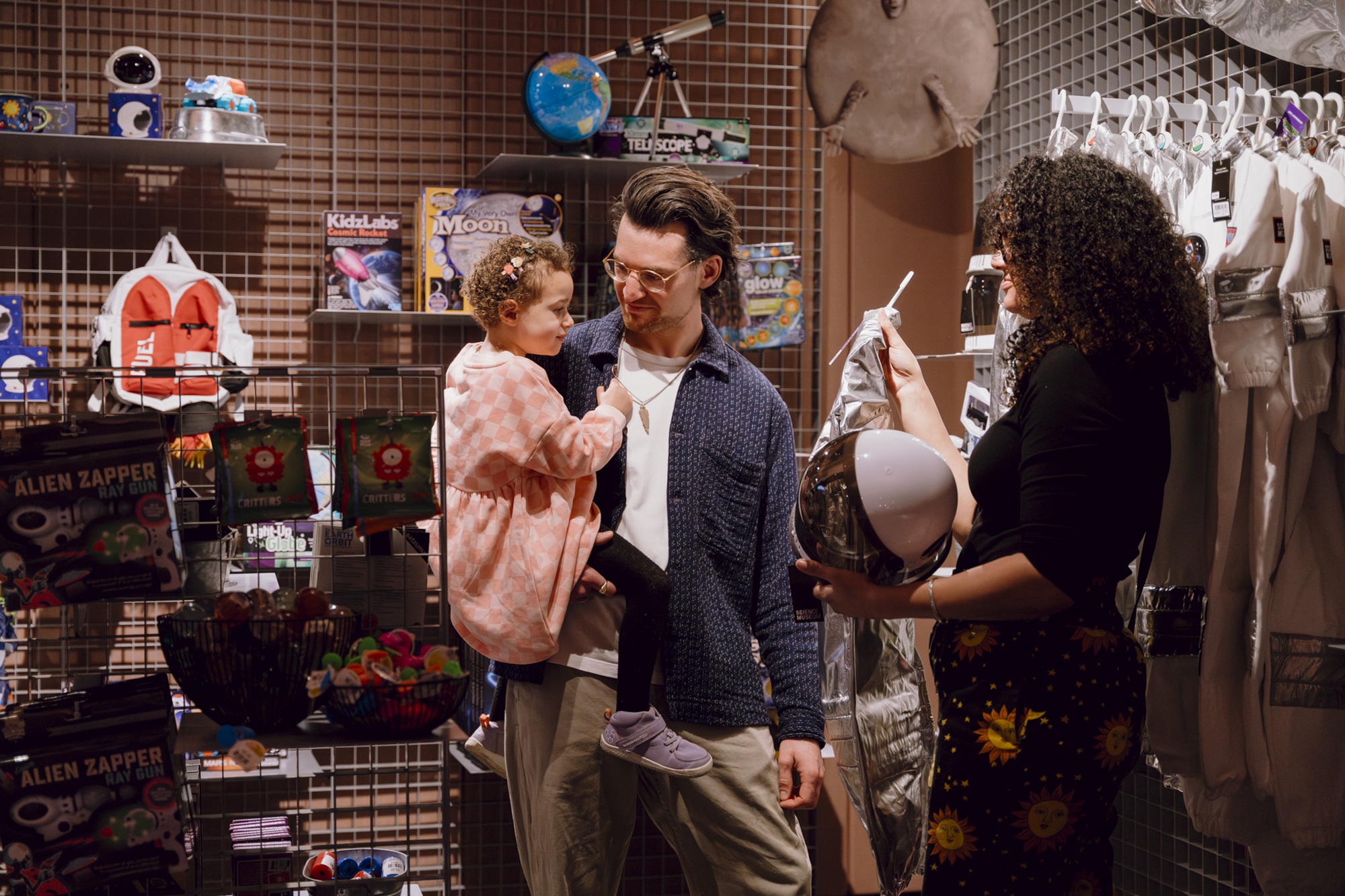 Dad and daughter in the museum shop