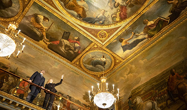 Curator Letizia Treves and Director Gabriele Finaldi on a balcony overloooking the painted ceiling of the Blenheim Saloon of Marlborough House, Pall Mall, London © The National Gallery, London