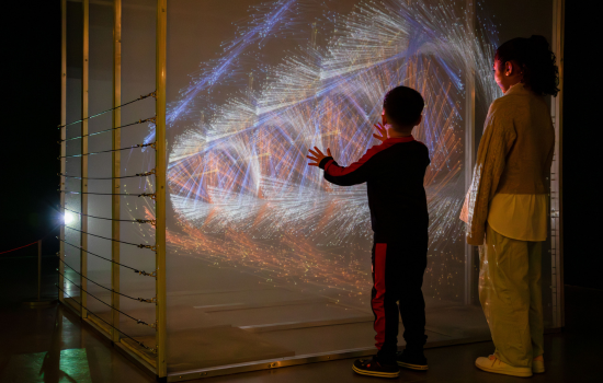 Children looking at a projection in Living Dots