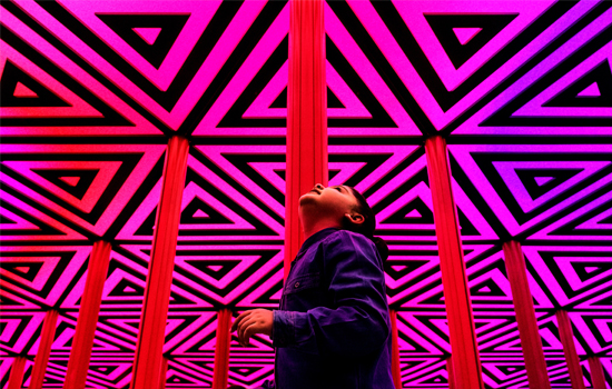 A girl looking up in Wonderlab